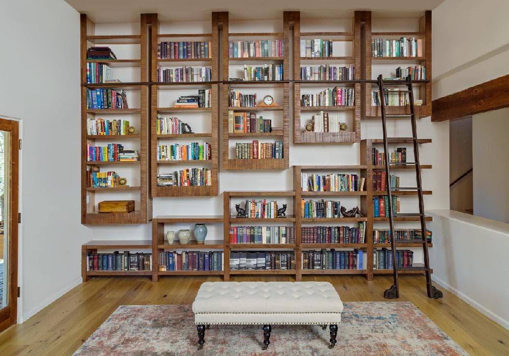 Modern bookshelf design featuring custom shelving, elegant storage solutions, premium wood finishes, and stylish interior organization for contemporary homes.