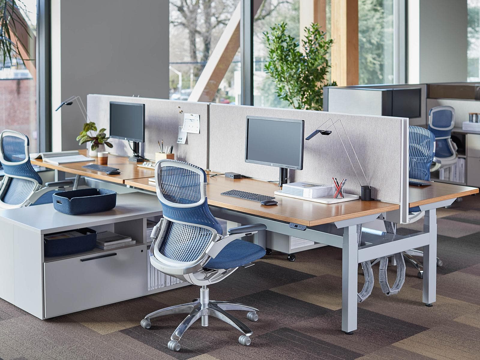 Modern workstation design featuring ergonomic desks, modular layouts, integrated storage, premium finishes, and productive office interiors for commercial spaces.