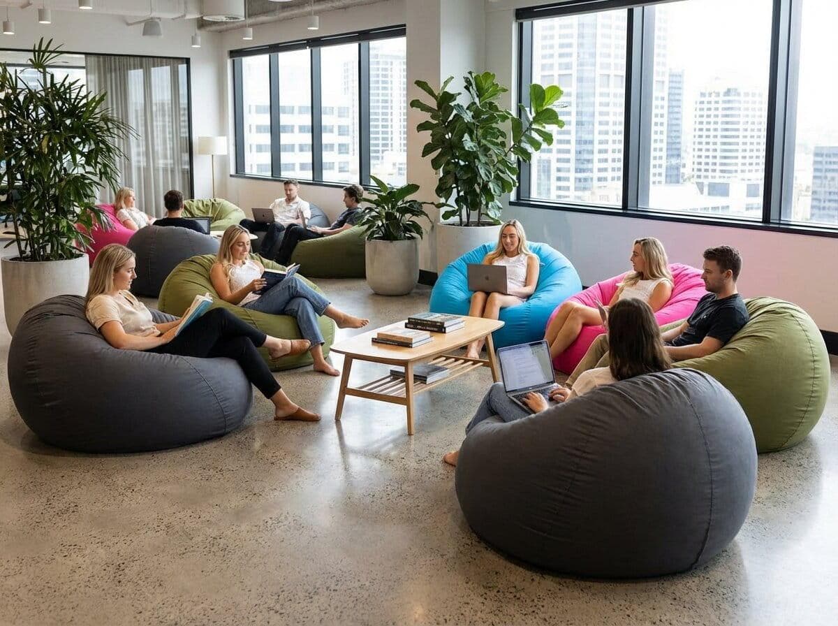 Modern breakout zone design featuring comfortable lounge seating, collaborative spaces, relaxing interiors, creative work environments, and contemporary office layouts.