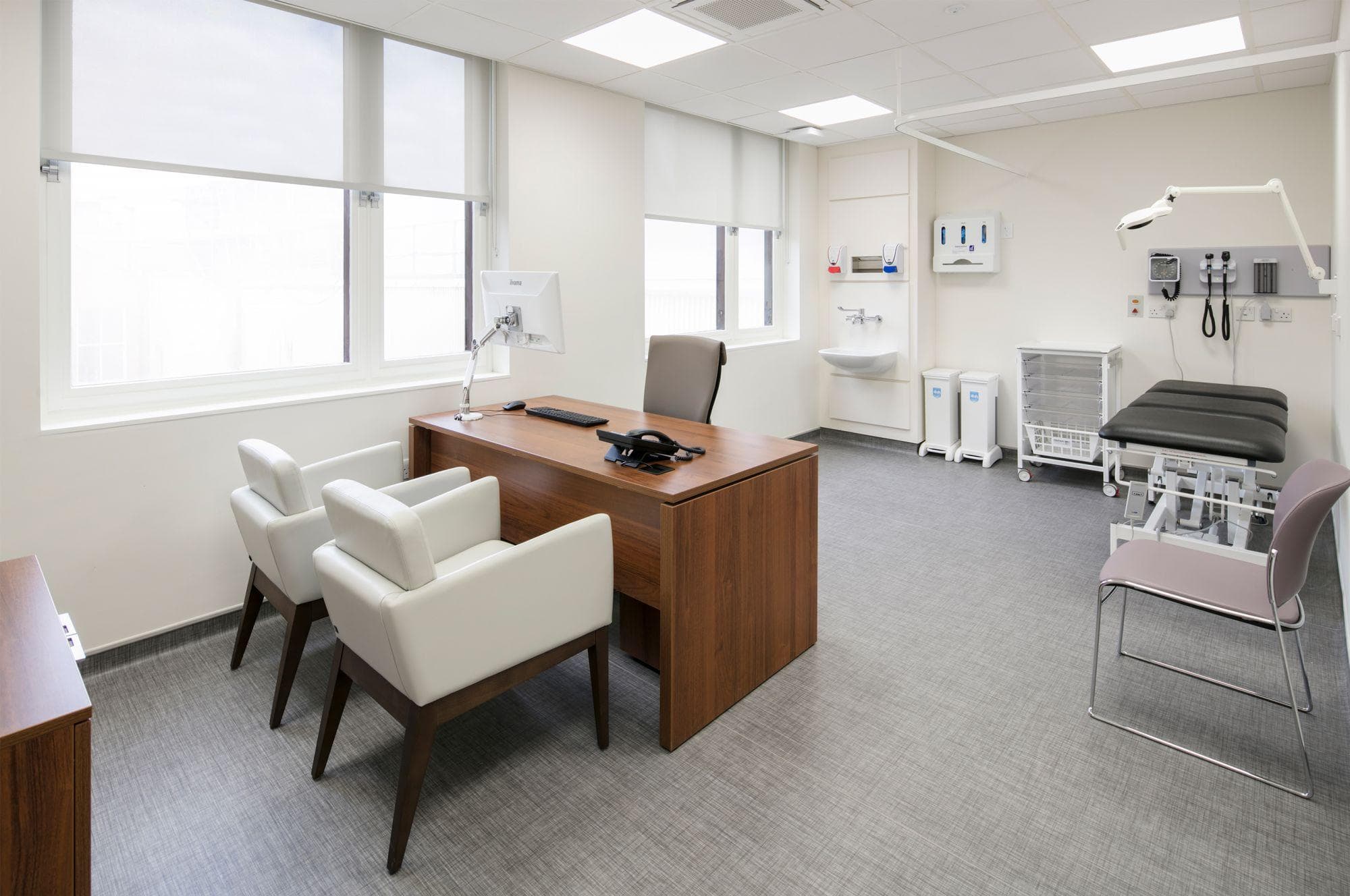 Modern consultation room design featuring private meeting spaces, ergonomic furniture, premium finishes, soundproof interiors, and welcoming professional environments.