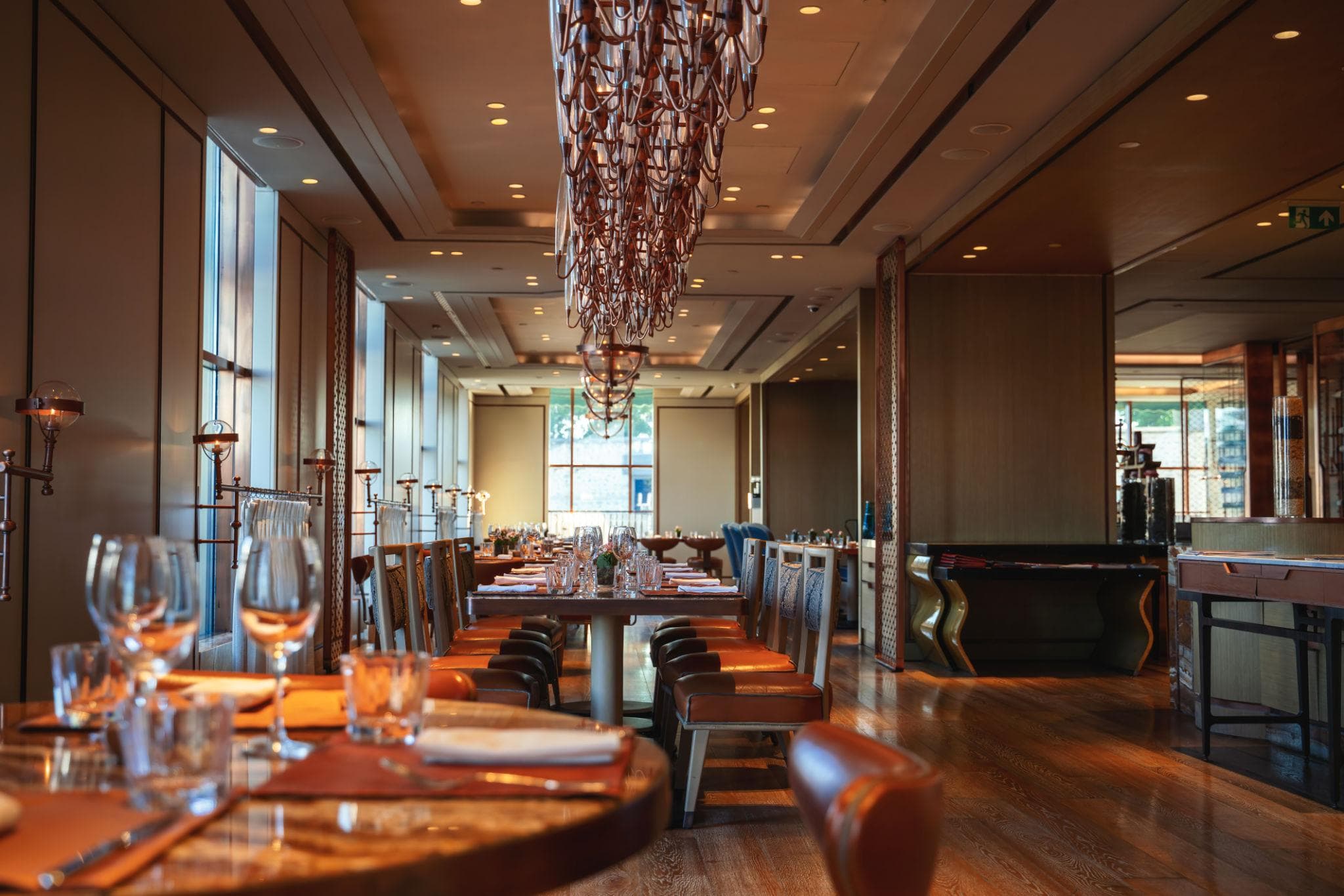 Luxury fine dining restaurant interior design in Delhi with elegant seating and ambient lighting